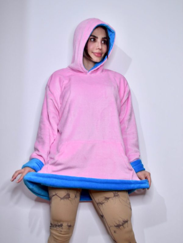 Buzo gigante rosado y azul